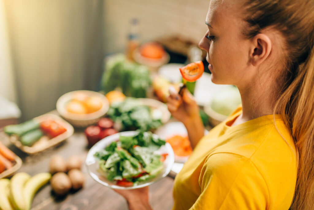 young woman eating healthy eco food 2021 04 02 20 15 53 utc 1